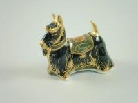 A Royal Crown Derby paperweight of a dog