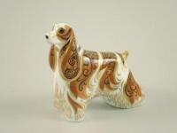 A Royal Crown Derby paperweight of a dog