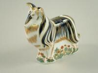 A Royal Crown Derby paperweight of a dog