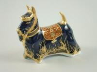 A Royal Crown Derby paperweight of a dog