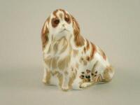 A Royal Crown Derby paperweight of a dog