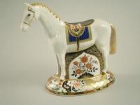 A large Royal Crown Derby paperweight of a Racehorse