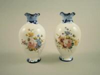 A pair of Royal Crown Derby floral vases