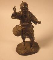 A Japanese Meiji period bronze fisherman