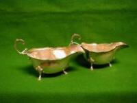 A pair of George VI silver sauce boats