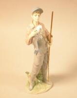 A Lladro figure of a fisherman