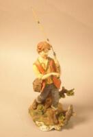 A Capo di Monte figure of a fisherman