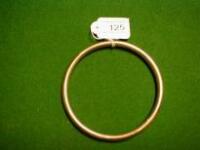 A 9ct gold slave bangle