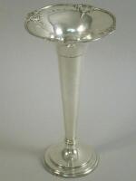 A silver trumpet shaped vase