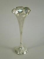 A hammered silver hexagonal trumpet vase