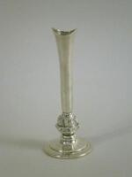 A silver bud vase