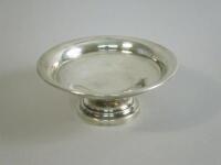 A plain silver stand