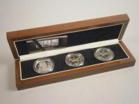 A Queen Elizabeth II Royal Jubilees silver crown set (3)