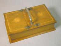 An Edwardian oak and marquetry two sided cigarette box