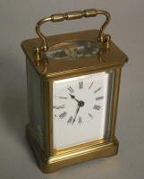 A French brass carriage timepiece