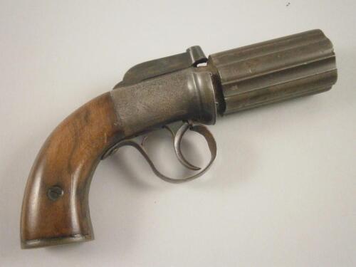 A 19thC pepper pot pistol with walnut stock