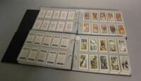 Two albums of miscellaneous cigarette cards.