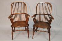 A pair of early 19thC ash and elm spindle back Windsor high chairs