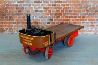 A live steam vintage styled goods carriage truck