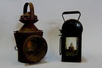 Two railway hand lamps