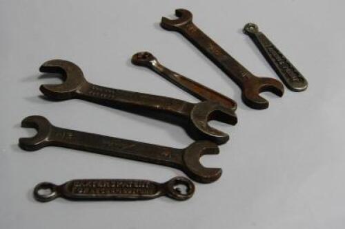 Various motoring and other cast metal spanners