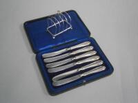 A cased set of silver handled butter knives