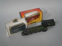 A Hornby OO Silver King 4-6-2 locomotive and tender and two boxed buses.