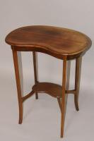 An Edwardian mahogany kidney shaped occasional table