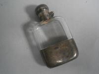 A small silver hip flask