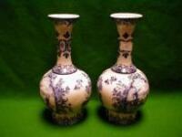 A pair of Delft bottle vases