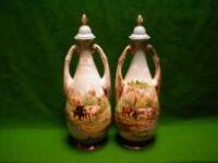 A pair of porcelain ovoid 2-handled vases and covers