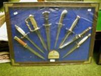 A reproduction collection of WWII combat knives