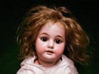 An Armand Marseille bisque headed doll