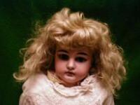 An Armand Marseille bisque headed doll