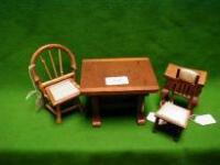 A beech dolls-house dining table