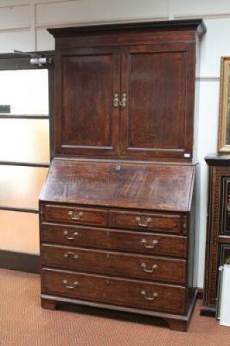 A late 18thC / early 19thC oak bureau bookcase