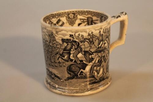 A mid 19thC Staffordshire mug commemorating the 'Battle of Balaklava'