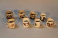 Eight WWI pottery and porcelain commemorative mugs.