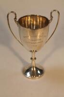 A George V silver two handled engraved trophy cup