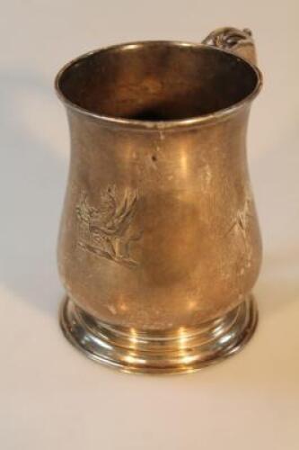 A George II silver baluster tankard engraved with a hippogriffin crest