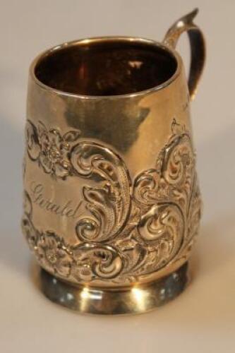 An Edwardian silver small repousse chased tankard