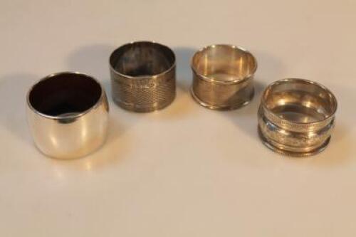 Four silver napkin rings