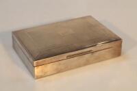 An Elizabeth II silver turned cigarette box