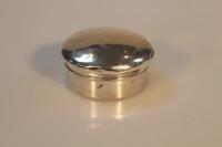 An Edwardian silver circular patch box