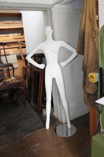 A shop mannequin with stand