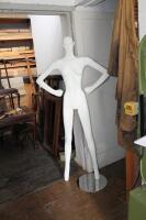 A shop mannequin with stand