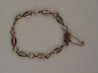 A 9ct gold oval link bracelet