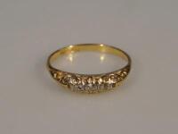 An 18ct gold diamond gypsy style diamond set dress ring