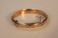 A 9ct gold hollow bangle