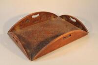 A 19thC carved folding tea tray.